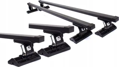 A set of black roof racks displayed on a white background.