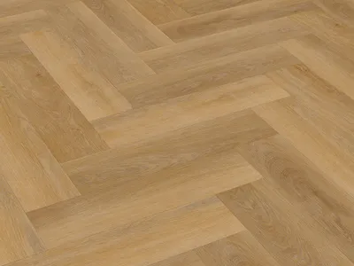 A close-up view of a herringbone-patterned wood-look floor.