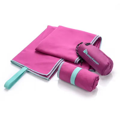 A pink microfiber towel and its carrying pouch are laid out on a white background.