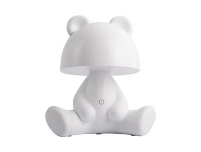 A white bear-shaped table lamp is shown against a white background.