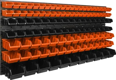 A wall-mounted storage system with multiple orange and black bins.