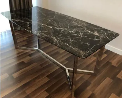 Produktbild von Casa Padrino Luxus Esstisch Schwarz / Silber 200 x 100 x H. 75 cm - Moderner Küchentisch mit Marmor Tischplatte und Edelstahl Gestell - Luxus Esszimmer Möbel