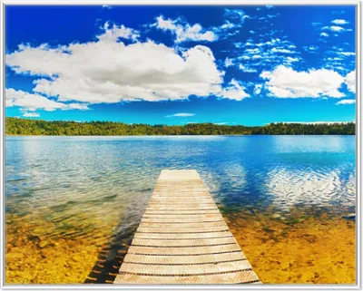 Produktbild von Wallario Wandbild Klarer See mit Steg - Blauer Himmel, Größe: 40,30 x 50,30 cm, Poster mit weißem Aluminiumrahmen