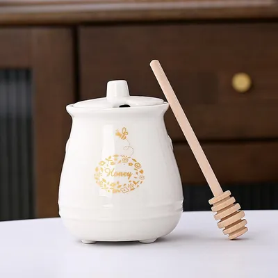 Produktbild von 300ml Keramik Honigglas mit Deckel Honigglas mit Holz Honigschaufel, Honigglas Set, Haus und Küche für Honig Lagerung (Weiß)