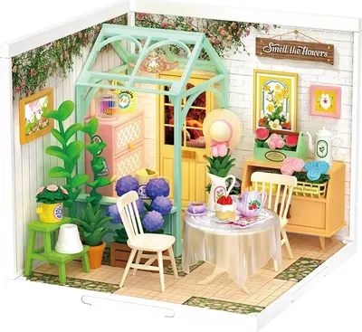 Immagine prodotto di RoboTime Casa in miniatura Seduta con tè in un giardino fiorito