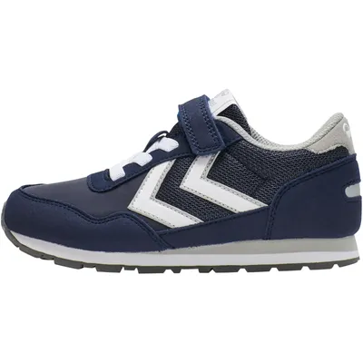 A side view of a single blue sneaker against a white background.