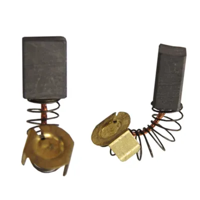 Two carbon brushes with springs and connectors, isolated on a white background.