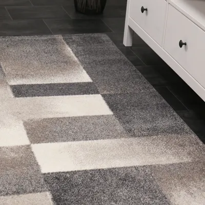 Image de Tapis design moderne avec motifs géométriques abstraits en gris et beige, dimensions:160x230 cm