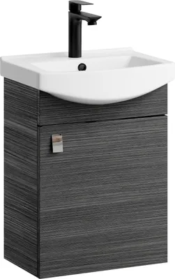 A modern bathroom vanity with a sink and faucet.