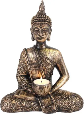 Productafbeelding van Boeddha theelichthouder - Meditatie ornament - Sfeerverlichting creëren - Handen met kaars - 27 cm hoog - Goudkleurig
