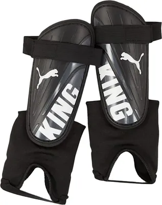 Immagine prodotto di Puma - Protezione tibia e caviglia "King" RD3762 (71 mm x 264 mm x 88 mm) (Nero/Bianco)
