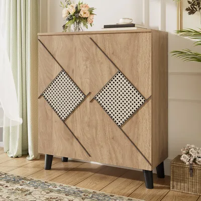 A wooden cabinet with a decorative front is shown in a room setting.