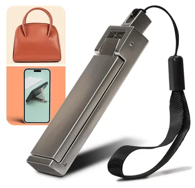 Produktbild von Taschenhalter Bag-Buddy – 2in1 Haken für Handtasche & Handyhalter, mit Anti-Rutsch-Pad, faltbar & tragbar, schützt Tasche vor Schmutz, ideal für Tisch & unterwegs