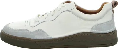 Side view of a white low-top sneaker with gray suede accents and a brown sole.