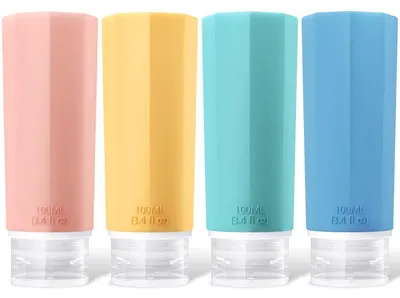 Zdjęcie produktu dla Zestaw czterech silikonowych butelek podróżnych, pojemność 100 ml, wielokrotnego użytku, szczelne, w kolorach: niebieskim, zielonym, różowym i żółtym