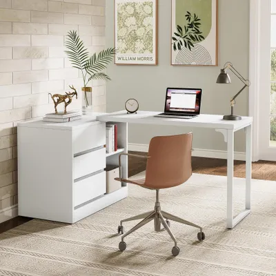 A modern home office setup with an L-shaped desk, chair, and artwork.