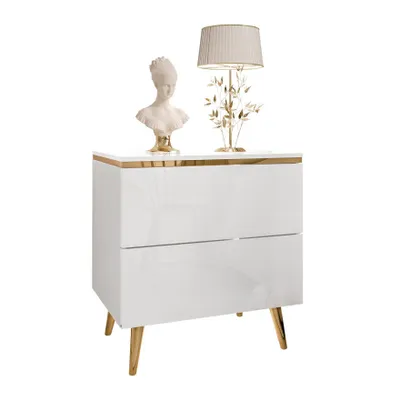 A white nightstand with gold accents and legs, topped with a bust and a lamp.