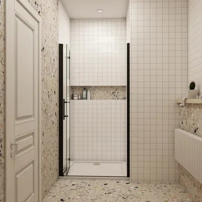 A modern bathroom with a shower enclosure.