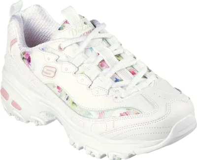 A white sneaker with a floral pattern.