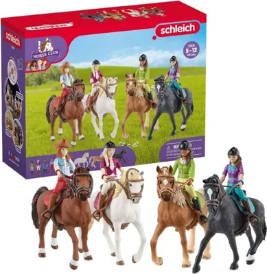 A product box for a Schleich Horse Club toy set, with toy horses and riders displayed on the box and in front of it.