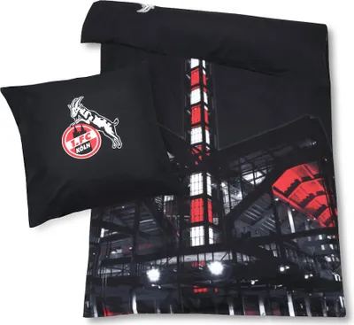 A black duvet cover and pillow with a stadium graphic and the 1. FC Köln logo.