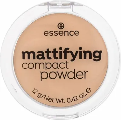 A top-down view of a compact powder in its clear plastic packaging.