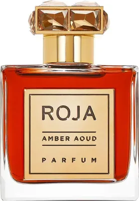 A close-up studio shot of a perfume bottle.