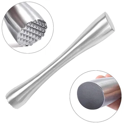 A stainless steel cocktail muddler is shown on a white background. Close-up insets highlight the textured end and the smooth, hollow end.