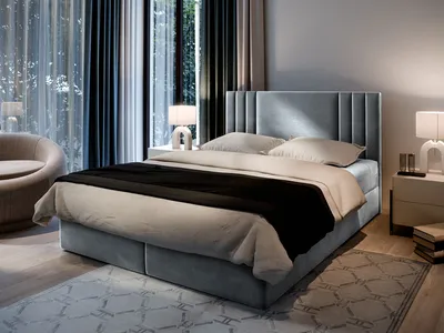 A bedroom scene with a bed, nightstand, and chair.