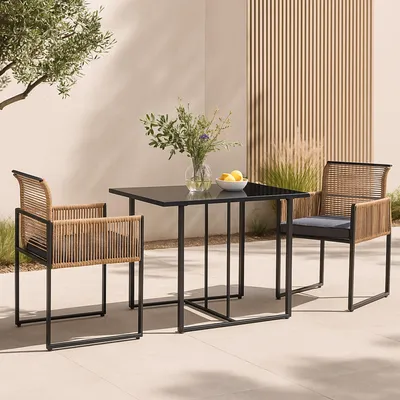 An outdoor dining set with a table and two chairs on a patio.