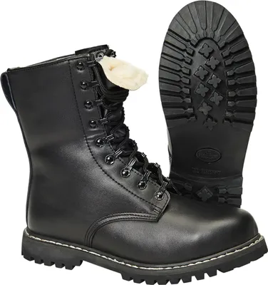 A pair of black leather boots, one standing upright and the other showing the sole.