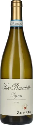A bottle of white wine against a white background.