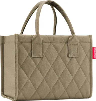A studio shot of a quilted tote bag.