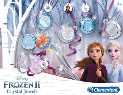 A marketing image for a Disney Frozen 2 Crystal Jewels craft kit, featuring the characters Anna and Elsa, along with the product components.