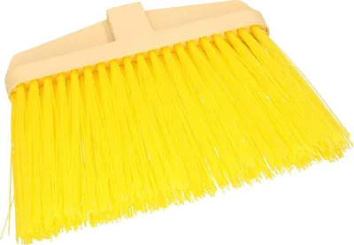 A close-up, studio shot of a yellow broom head with a beige plastic handle attachment, isolated on a white background.
