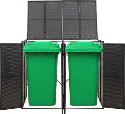 Two green trash bins inside a black metal frame with mesh sides and hinged lids.
