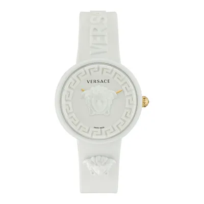 A white Versace watch with a Medusa head design on the dial, set against a white background.