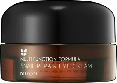 A close-up studio shot of a Mizon Snail Repair Eye Cream jar.