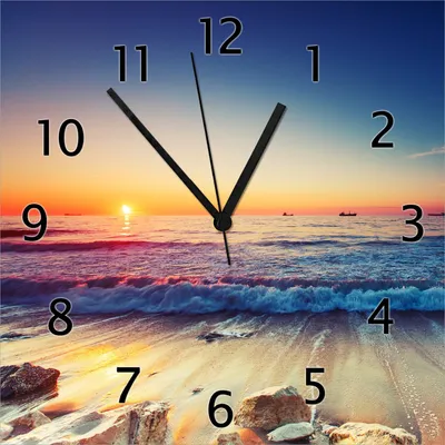 Produktbild von Wallario Design Wanduhr Sonnenuntergang am Meer mit Wellen am Strand aus Echtglas, Größe 30 x 30 cm