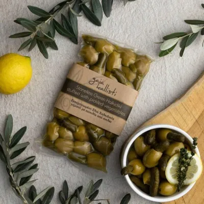 Produktbild von Gaia Kallisti Grüne Halkidiki Oliven ohne Kern mit Gurkenfüllung 250 g