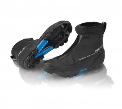 A pair of black winter cycling shoes with blue accents, shown from a slightly elevated angle against a white background.