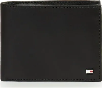 A black leather wallet with a small Tommy Hilfiger logo in the bottom right corner.