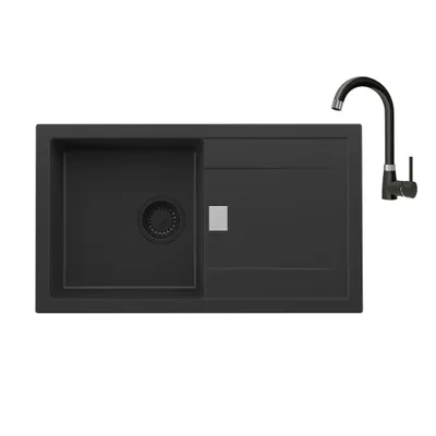 A black kitchen sink and faucet set on a white background.