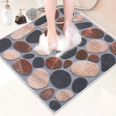 Image de Tapis de douche carré antidérapant avec surface « Air-Ederm » et trous de drainage.