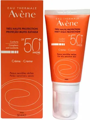 A product shot of an orange sunscreen tube and its box.