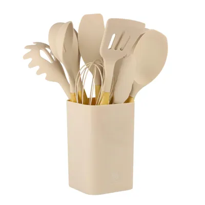 A set of kitchen utensils in a holder.