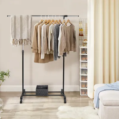 Clothes rack with clothes and accessories.