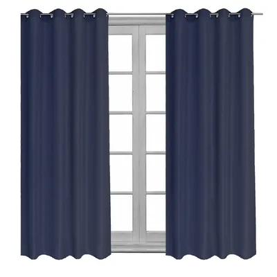 Two navy blue curtains hanging in front of a window.