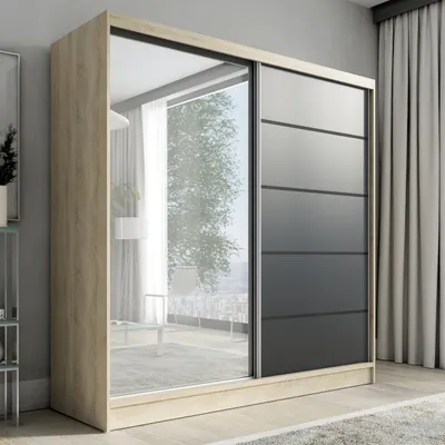 A modern sliding door wardrobe with a mirrored front and wood-effect frame, set in a room with curtains and a carpet.
