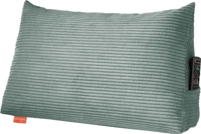 A turquoise corduroy backrest pillow with a side pocket containing a remote control, placed on a white background.